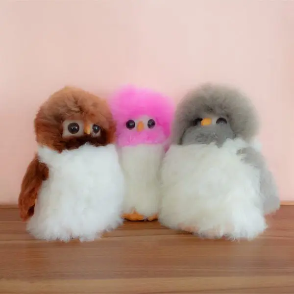 Handmade alpaca fur plush. Owl shape “Killary”. Height: 25 cm.